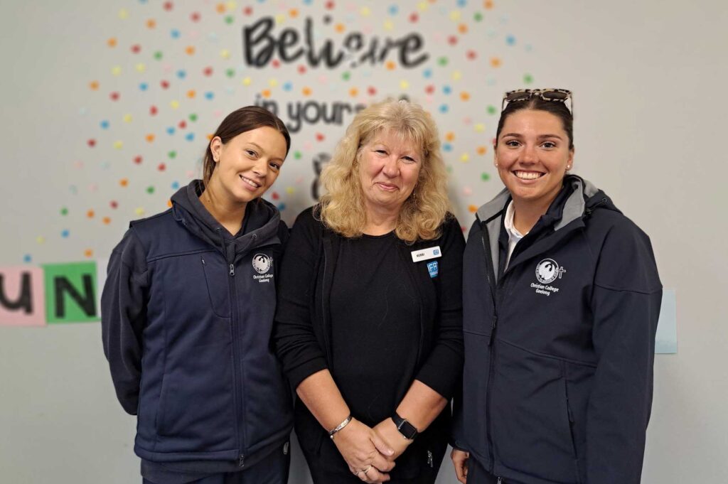 Education Support trainer with two of her students